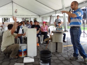Moises Pivaral and I training almost 90 volunteers how to install Bio-sand filters.